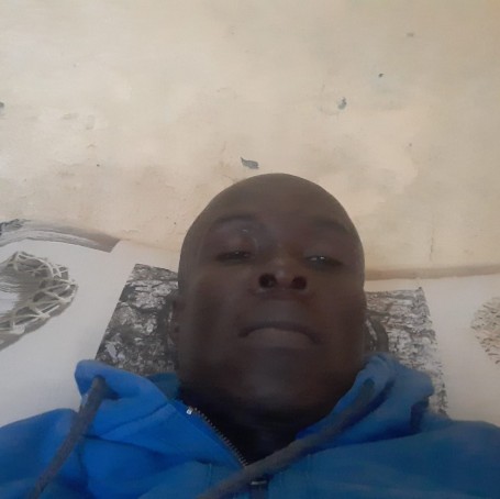 Assan, 45, Banjul