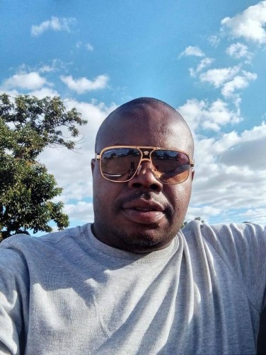 Douglas, 40, Harare