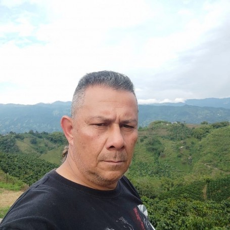 Carlos Arturo, 57, Bogota