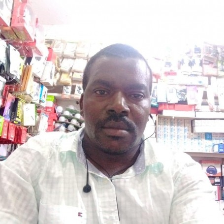 SNsam, 41, Kampala